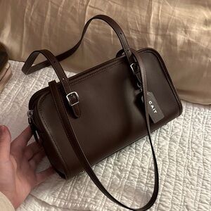 Coach Swing Zip Maple